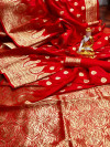 Red color soft banarasi lichi silk saree with golden zari work