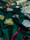 Dark green color soft lichi silk saree with golden and silver zari work