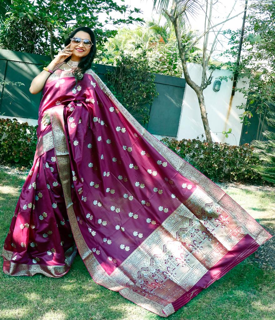 Magenta color soft lichi silk saree with silver and golden zari weaving work