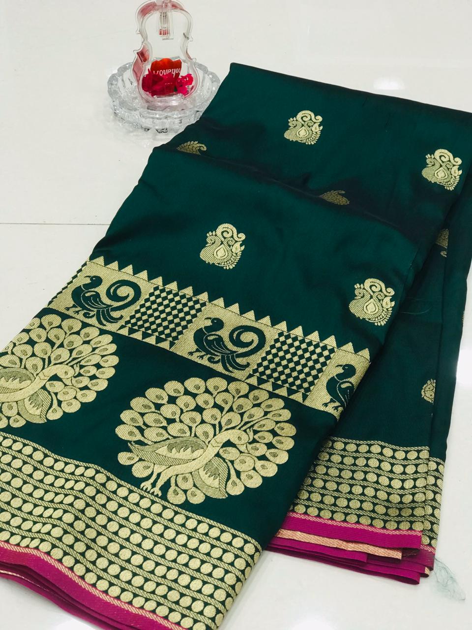 Green color banarasi silk jecquard work saree with rich pallu