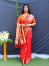 Red color soft paithani silk saree with golden zari work