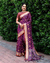 Magenta color patola silk saree with zari woven design