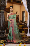 Rama green color soft linen silk saree with zari weaving work