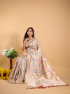 Off white color banarasi silk saree with zari weaving work