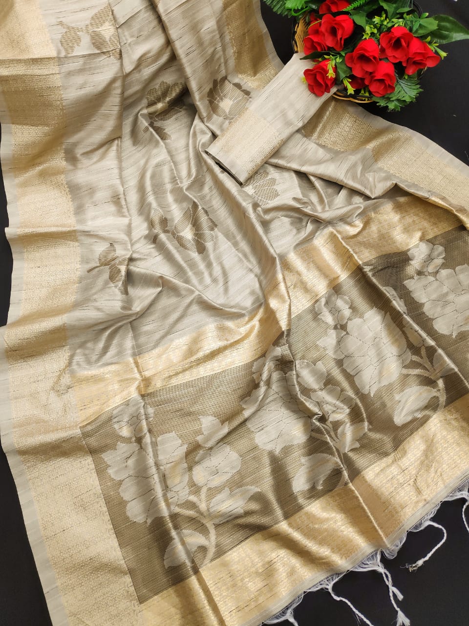 Cream color soft mulberry silk saree with zari woven butta and border