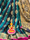 Blue and green color soft banarasi silk saree with zari woven border