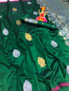 Dark green color soft banarasi silk saree with silver zari work