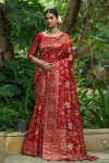 Red color tussar silk saree with zari woven border