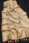 Cream color tissue silk saree with embroidered work