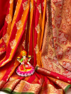 Red and orange color soft banarasi silk saree with zari woven border
