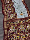 Maroon color pashmina silk saree with patola design