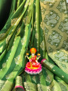 Green color soft banarasi silk saree with zari woven border