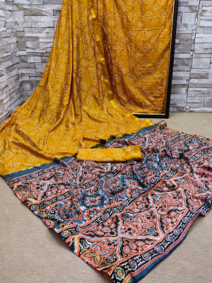 Mustard yellow color soft bandhej silk saree with printed work
