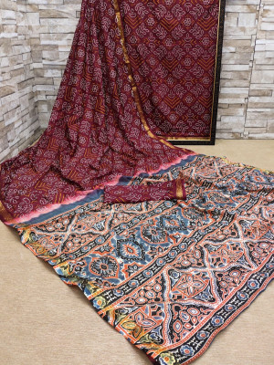 Maroon color soft bandhej silk saree with printed work