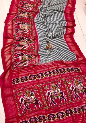Rani pink color pashmina silk saree with patola design