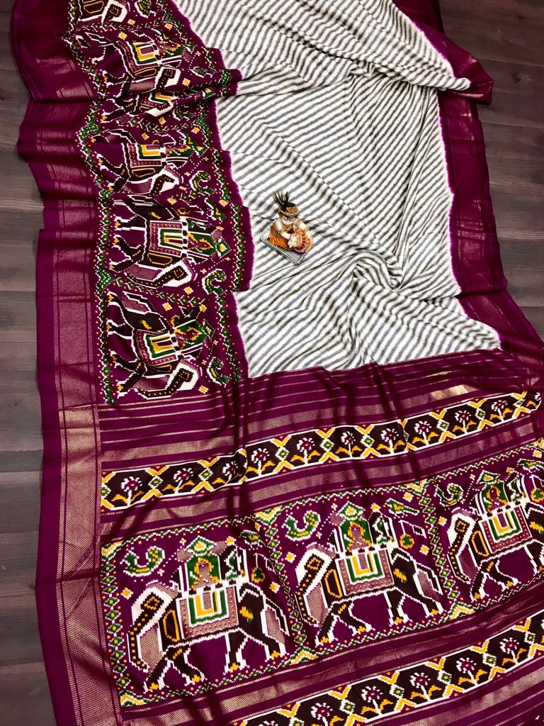 Magenta color pashmina silk saree with patola design