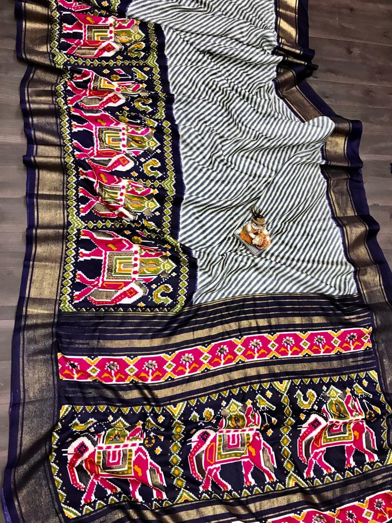 Navy blue color pashmina silk saree with patola design