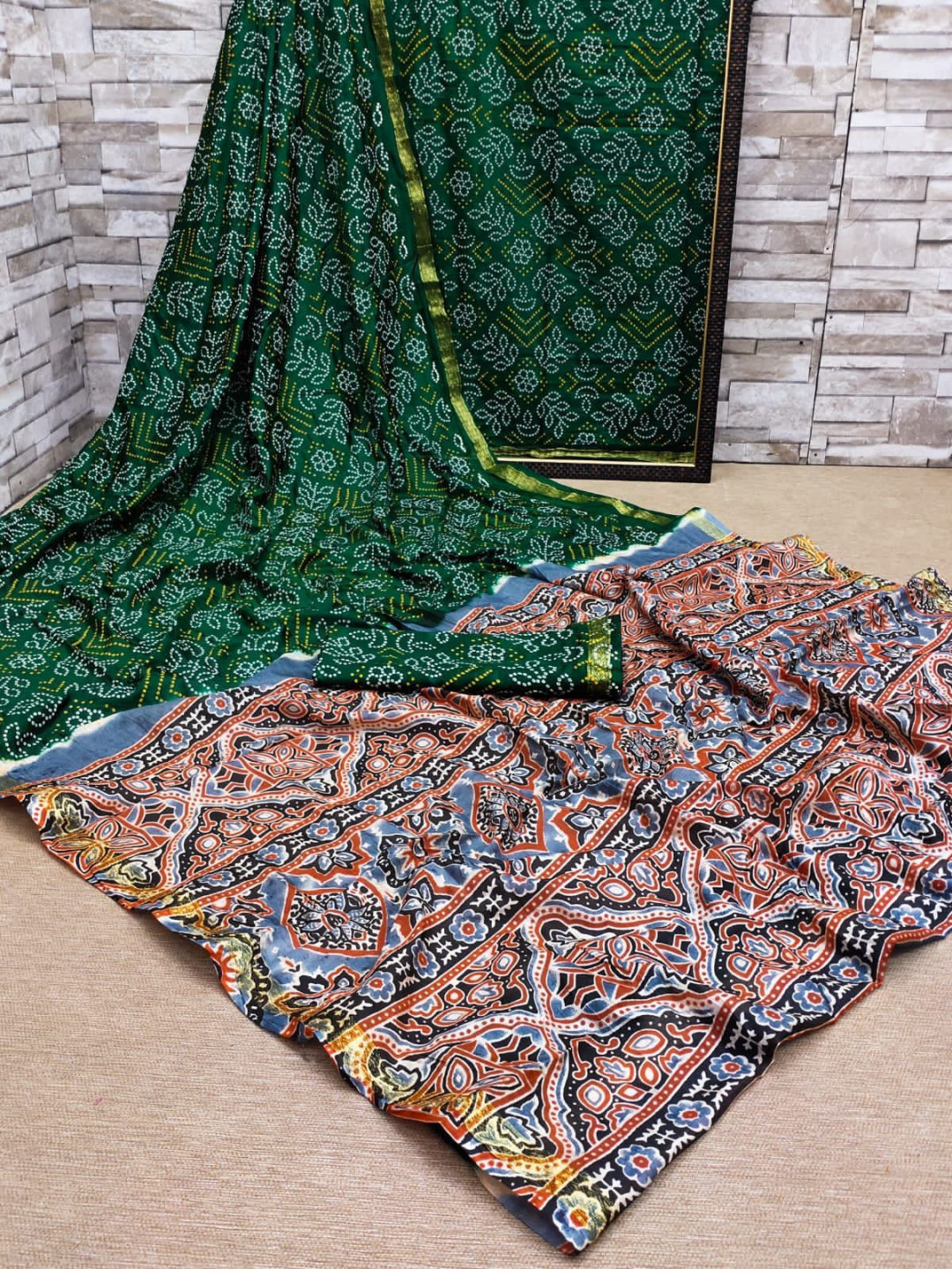 Dark green color soft bandhej silk saree with printed work