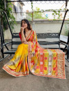 Yellow color dola silk saree with printed and sequence work
