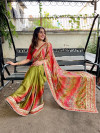 Mehndi green color dola silk saree with sequence work