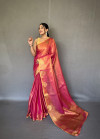 Rani pink color tissue silk saree with zari weaving work