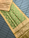 Pista green color banarasi silk saree with zari weaving work