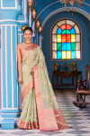 Pista green color soft organza silk saree with zari weaving work