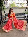 Red color dola  silk saree with printed and sequence work
