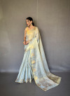 Sky blue color tissue silk saree with zari weaving work