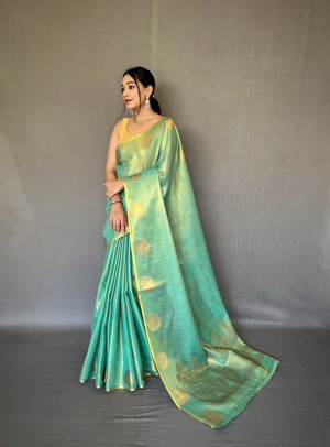 Sea green color tissue silk saree with zari weaving work