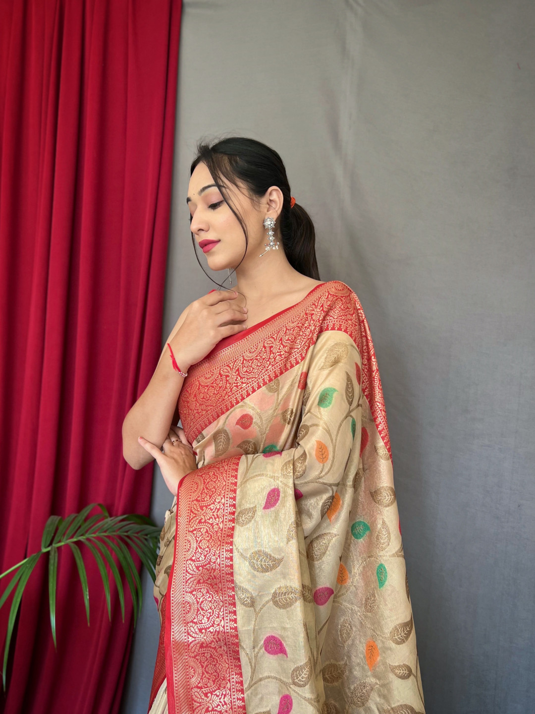 off-white-color-tissue-silk-saree-with-zari-weaving-work