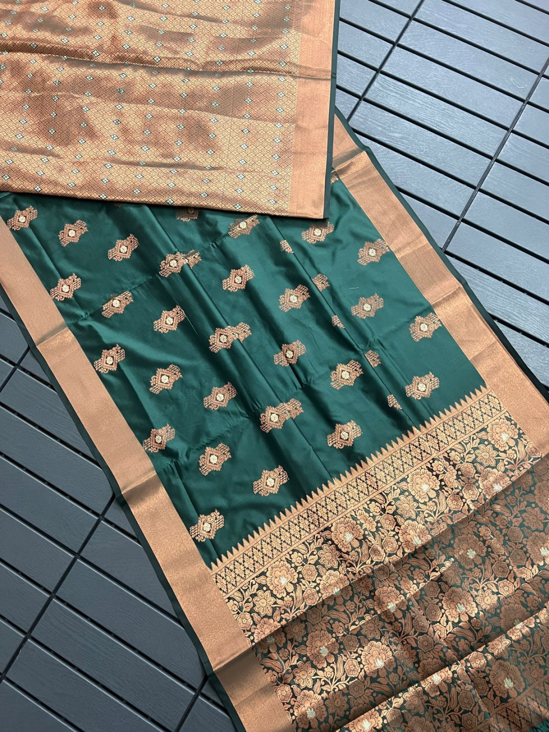 Dark green color banarasi silk saree with zari weaving work