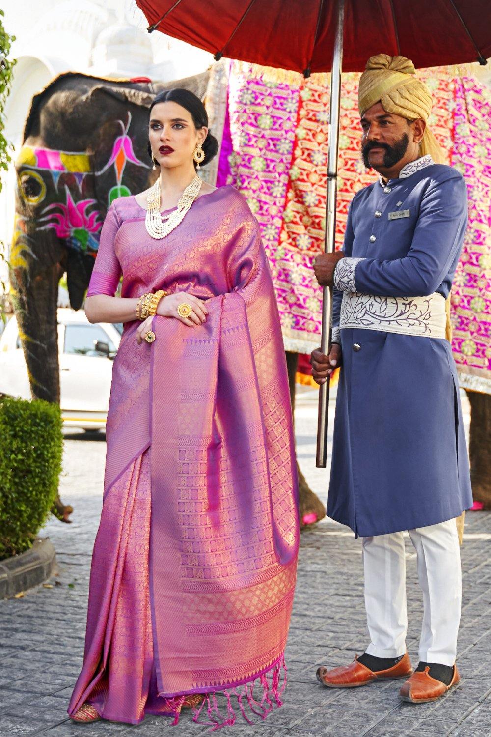 Purple color kanjivaram silk saree with zari weaving work