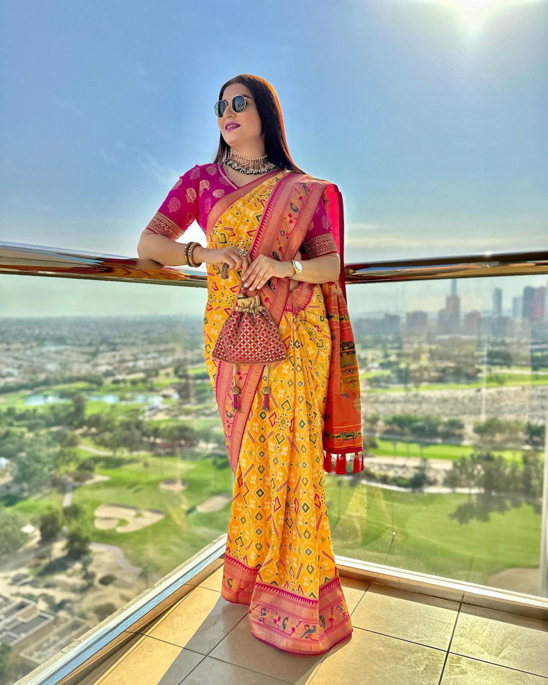 Yellow color patola silk saree with meenakari zari weaving work