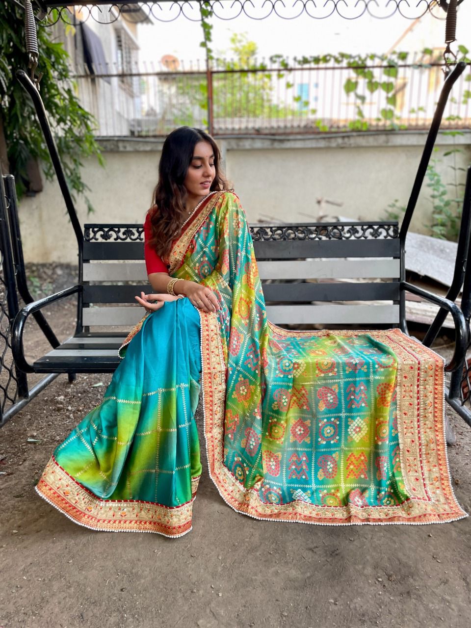 Firoji color dola silk saree with printed and sequence work