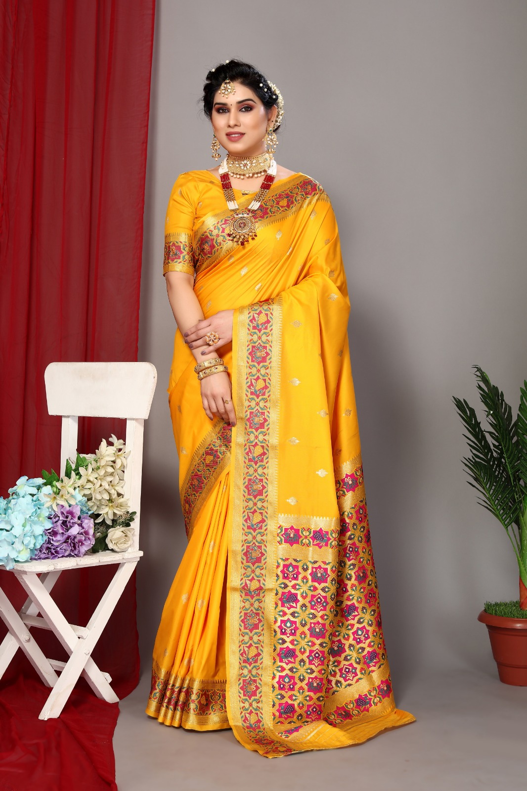 Yellow color banarasi silk saree with zari weaving work
