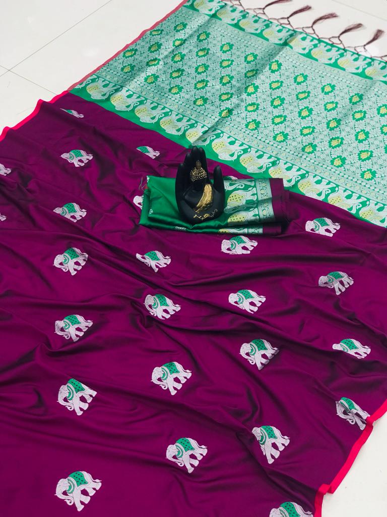 Magenta color lichi silk saree wit silver zari weaving work