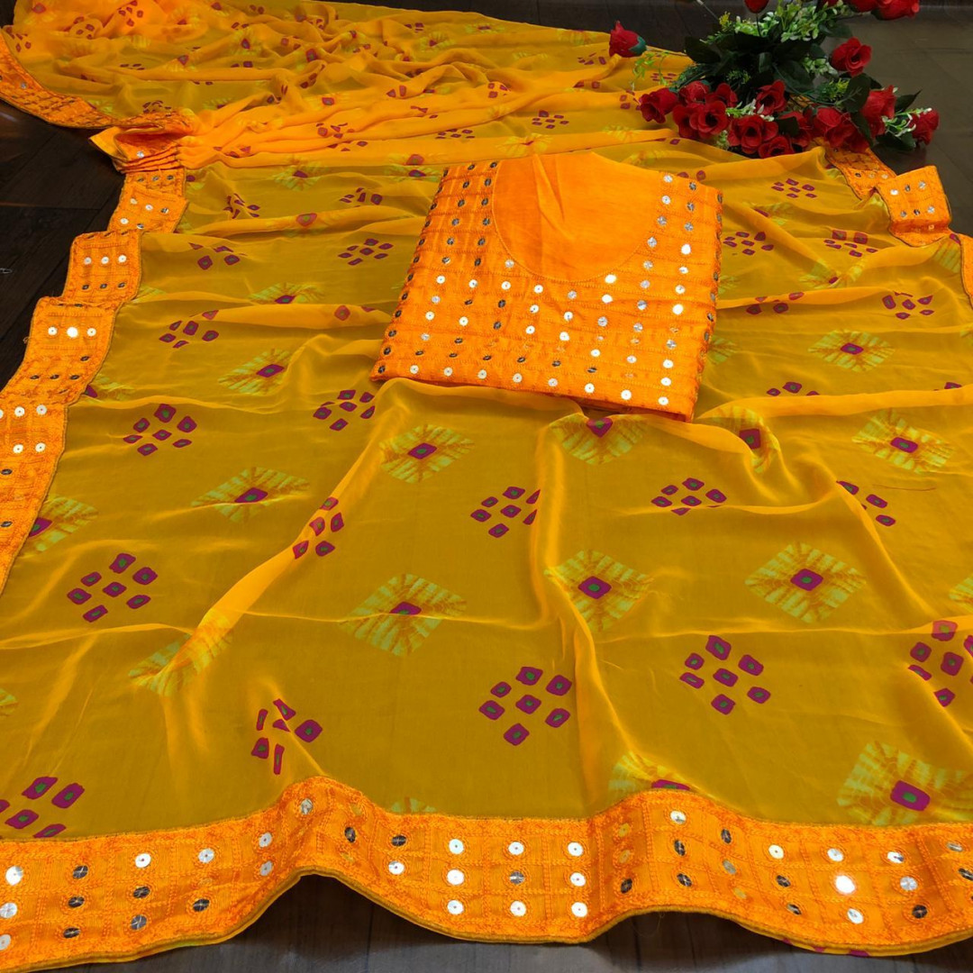 Yellow color georgette bandhani saree with border work