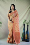 Peach color tussar silk saree with golden zari weaving work