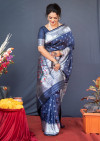 Navy blue color paithani silk saree with silver zari weaving work