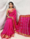 Pink color bandhani silk saree with khadi printed work