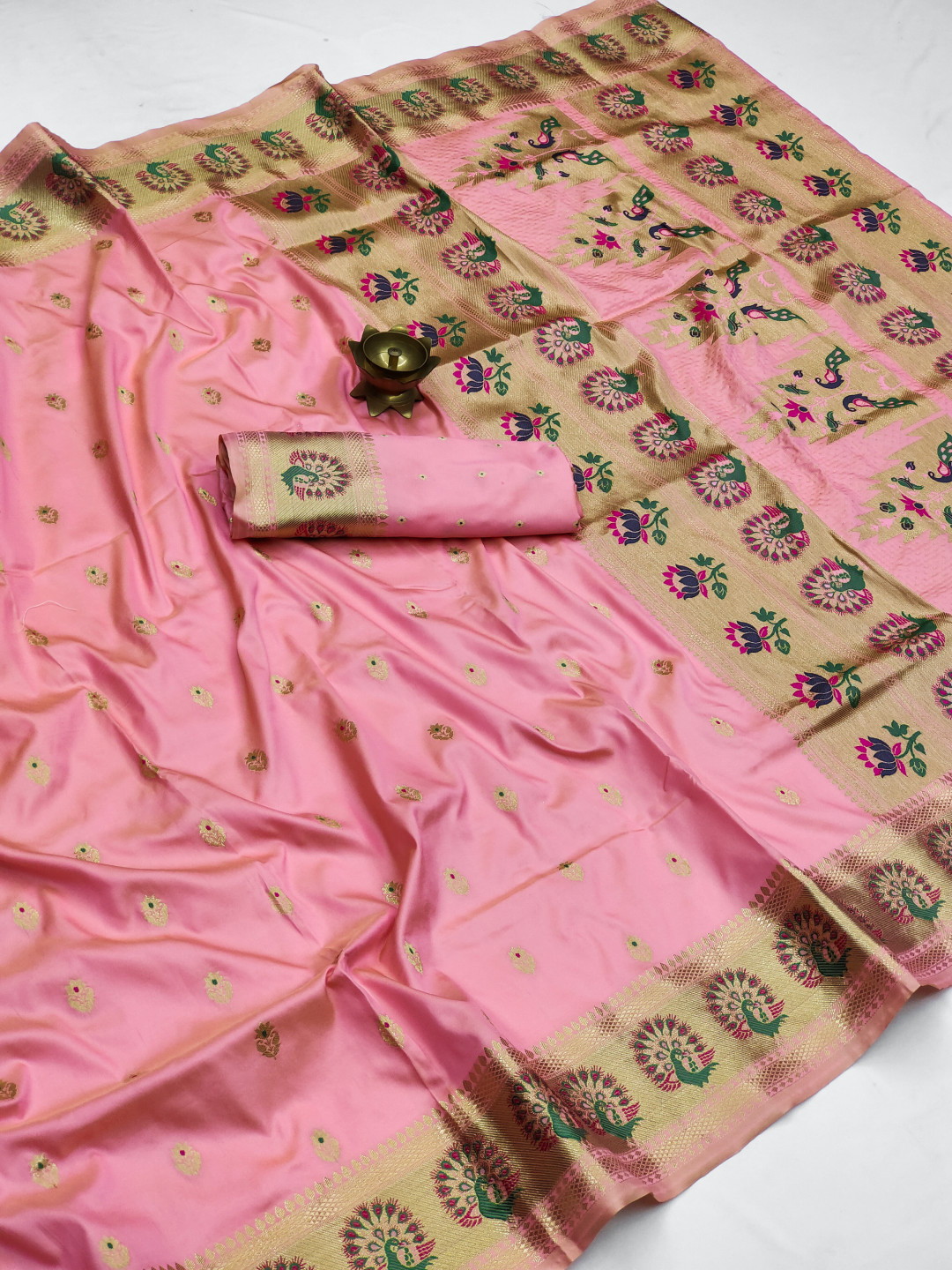 Baby pink color paithani silk saree with zari weaving work