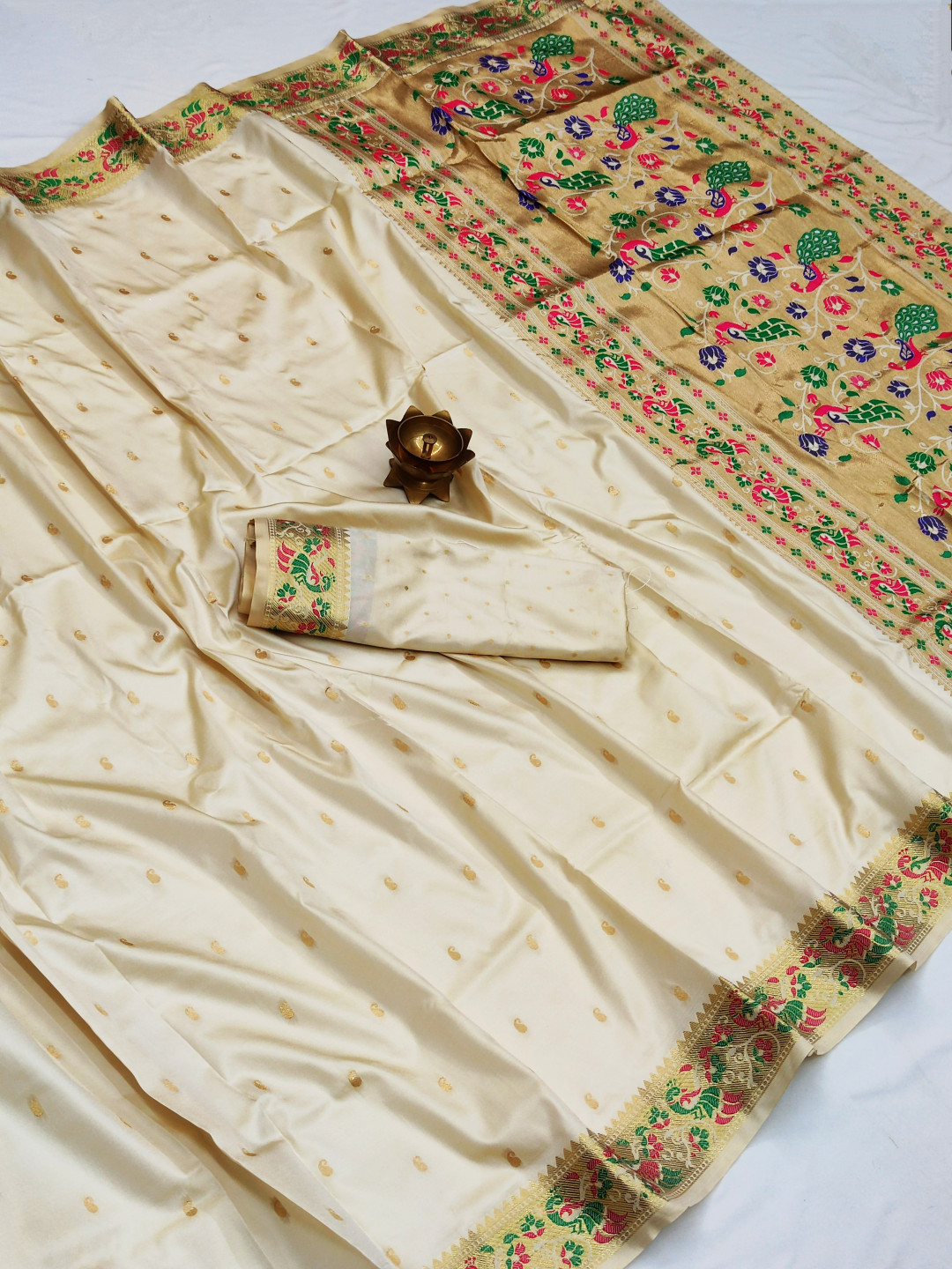 Off white color paithani silk saree with zari weaving work