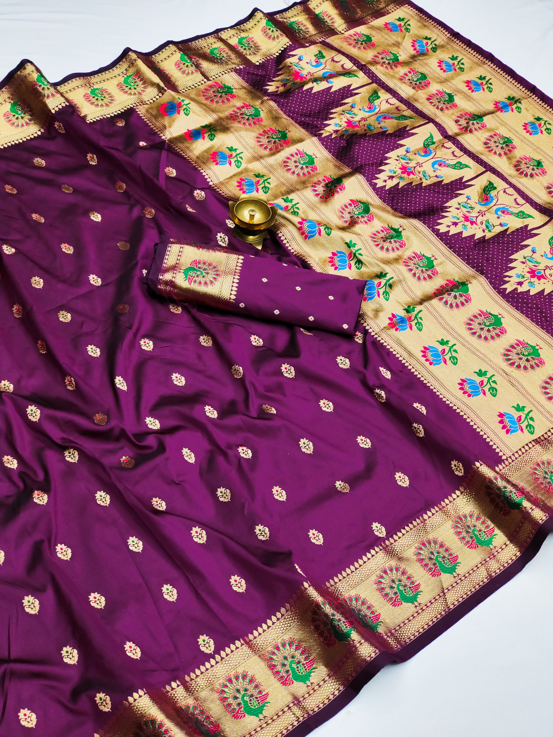 Magenta color paithani silk saree with zari weaving work
