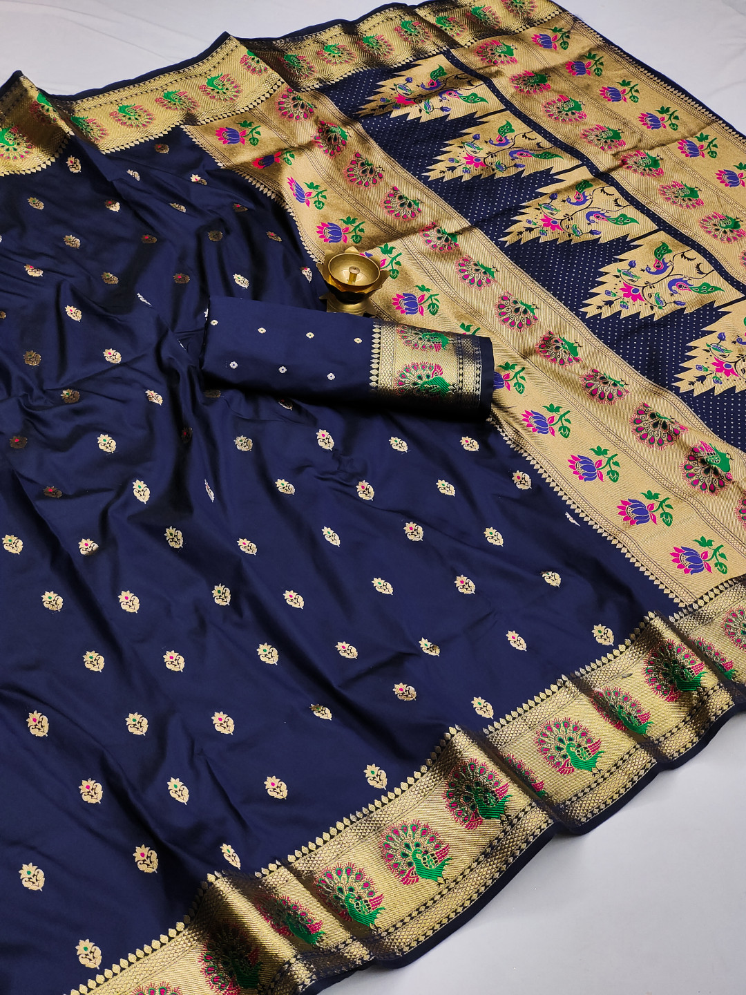 Navy blue color paithani silk saree with zari weaving work