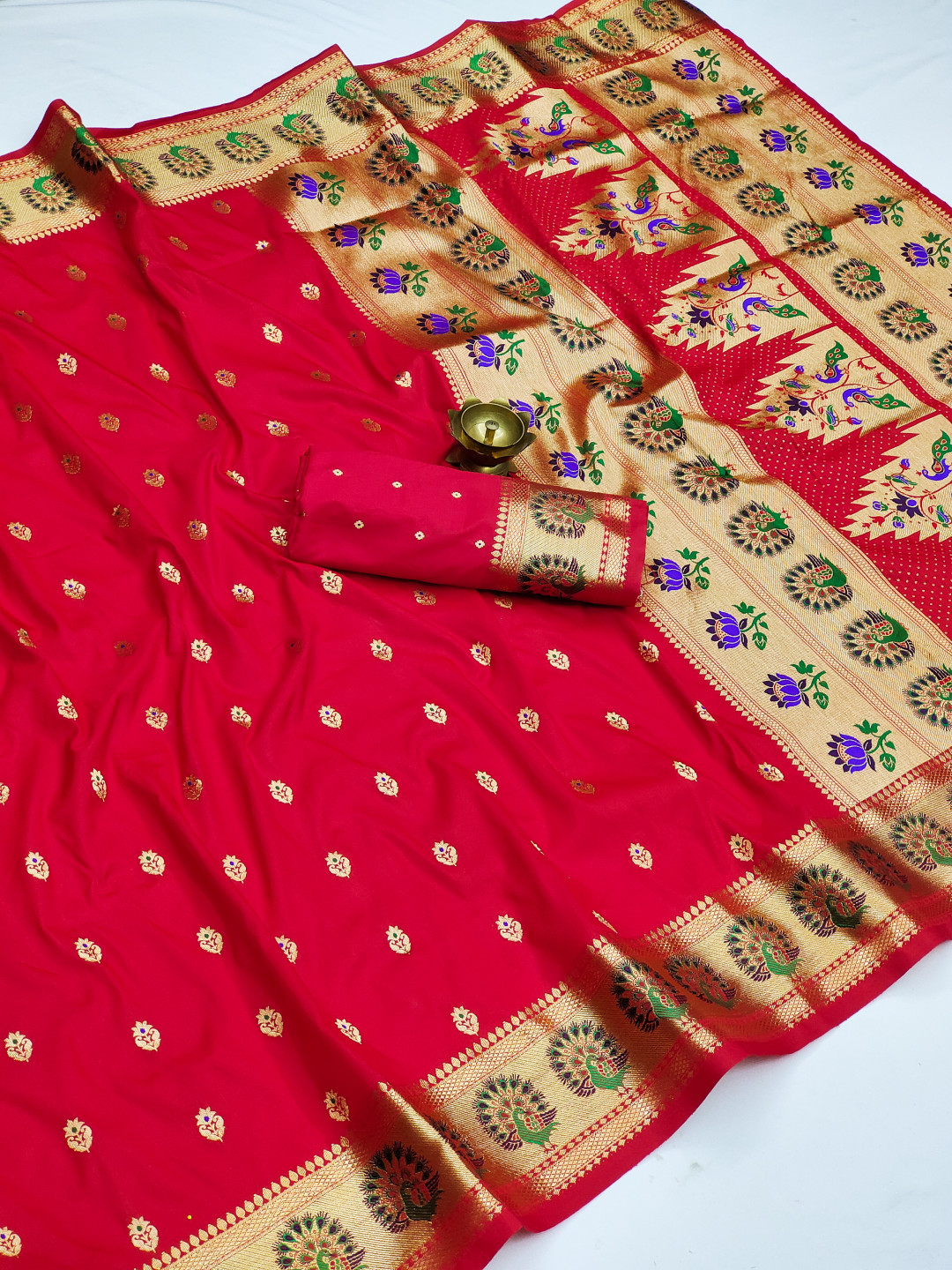 Red color paithani silk saree with zari weaving work