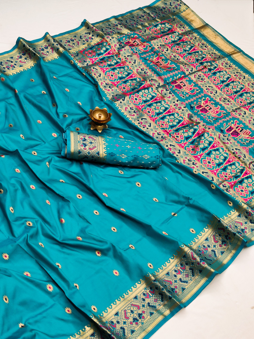Firoji color paithani silk saree with golden zari weaving work