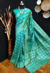 Firoji color raw silk saree with woven design