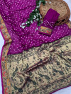 Magenta color soft hand bandhej silk saree with zari weaving work