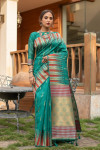 Rama green color pure tussar silk saree with ikat woven border